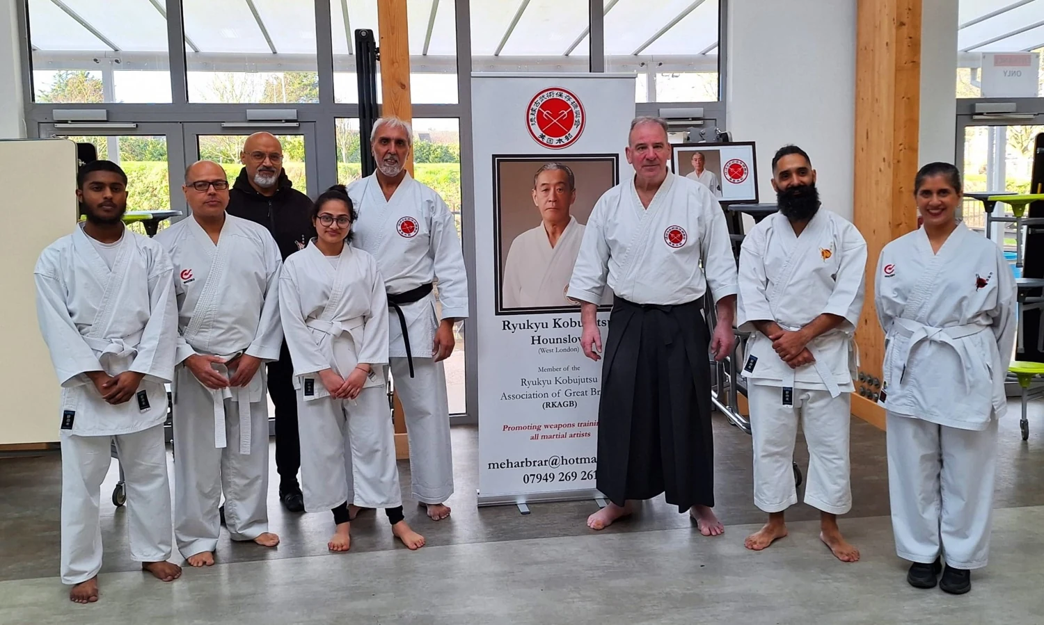 A community of martial artists together after a course