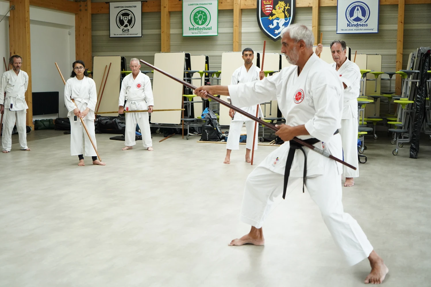 A Bo demonstration with practitioners watching